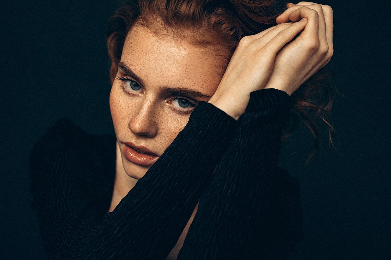Close-up portrait of a serene young woman.